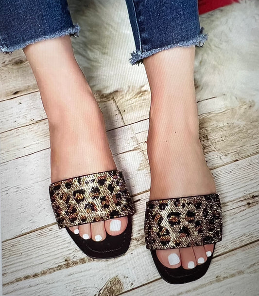 Comfort fit slides bring the ultimate comfort and style to your casual designs. A flat contoured footbed, flexible fabrication, a wide toe strap and a slip-on design mean all-day wear is no problem at all.  Medium width Rhinestone comfort fit sandal Upper: Vegan suede